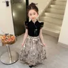 Abiti da ragazza 2024 Nuova vestito tradizionale cinese estivo abito Hanfu per ragazze gonna a cavallo per bambini principessa Hanbok due pezzi set L240402