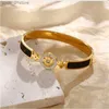 Bracelets de charme Europe America Top Designer Jewelry la Women Titanium Steel Black White Email Gravure Gravure 18K Gold Bangle L46