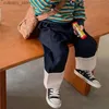Calças calças calças de retalhos de crianças da primavera nova versão coreana para meninos e meninas cor combinando calças de algodão soltas para calças para crianças bebês L46
