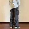 Pantaloni da carico uomo streetwear pantaloni hip hop elastico in vita elastico pantaloni di lunghezza della caviglia neri harajuku casual tascabili pantaloni 240402