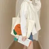 Kvällspåsar koreanska duk kvinnor axelväska kvinnlig student tote shopper 2024 stor tecknad tryck hand flicka bokväska kvinna handväskor