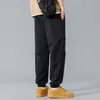 Spring and Automne Saison Nouveau homme coréen Edition lâche Couleur solide Multi-bouche sac élastique travail pantalon décontracté Internet rouge même style