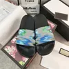 Sandalias de diseño para hombres y mujeres zapatillas florales zapatillas impresas zapatillas de playa de playa zapatillas de playa de zapatillas de playa de verano de mares
