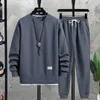 Tracksuits voor heren 2024 Leer- en herfstmodemerk Ronde nek Hong Kong -stijl Wafle Set Casual knappe sporten Tweede stuk