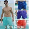 Grande taille de 4 minutes de séchage rapide pantalon de plage montre la couleur dans l'eau pantalon de plage imprimé magique pour hommes nageants