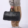Luxe mode -ontwerper Duffel Bags unisex paar stijl hoogwaardige echte lederen vrije tijd en praktische unisex -versie totes reistassen