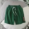 Eenvoudige en veelzijdige Solid Color Men's Shorts, modieuze losse size herencapri's, Summer Trendy Brand Leather Beach Pants