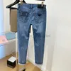 Jeans de créateurs de jeans masculins jeans triangulaires de haute qualité pour un style mince d'été masculin avec quatre côtés élastiques slim small petit pantalon décontracté à la mode