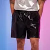 Shorts pour hommes pantalons en cuir brillant des vêtements de performance une pièce pour les fêtes disco