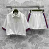 Designer di abiti da due pezzi all'inizio della primavera in stile coreano Minimalist Polo Collar Pullover Pullover Short Show Skirt Set Ltf7