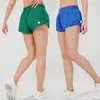 LL Womens Yoga 2.5 Shorts Outfits With Exercise Fitness Wear Short Pants Girls Running Elastic Pants Sportswear Pockets Speed Up Quick Drying