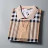 2024 Nouveau créateur de luxe pour hommes T-shirt décontracté Polo Fashion Fashion Trendy Plaid Stripe Polo Clothing M-3XL