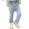 Broekmeisjes jeans lente en herfst nieuwe Koreaanse versie babymeisje casual broek knop elastische mode kinderen kinderen flard pants l46