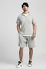 Miyake Lapel Top Polo T Shirt للرجال مطاطين على الأكمام القصيرة الصيفية ملابس فضفاضة أزياء الشارع 240322