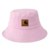 Vêtements de travail des pêcheurs de couleur unie, chapeau de bassin décontracté, marque de tendance d'été pour femmes, étiquette en cuir, sortie en plein air pour les couples, Sunshade Hat Trend