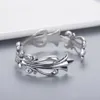 Kwaliteit Chrome hoge sieraden Bracelet Hollow Cross Flower Open Eind Bangle Ring Hip Hop Niche Design Retro Persoonlijkheid Modeontwerper Sieraden Geschenk Groothandel ER