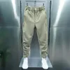 Pantaloni da uomo uomo pulsante elastico in vita lunghe tasche maschili a fissaggio solido polsini cuffi da tennis pantaloni sportivi