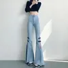 Jeans pour femmes 2024 printemps bleu clair en denim pantalon femelles coréen slim fit côté fendu femme vintage haute taille nouage