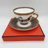 Tazze di piattini con handy regalo squisito bere valore in ceramica scatola di tazza originale tazza d'ufficio caffè alto caffè per novità