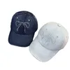 Ball Caps 2024 Koreańska wersja dżinsowego Bow Point Diamond Baseball Hat Nisza damska wszechstronna słodka, regulowana sunshade sportowa czapka gorras