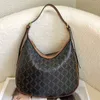 Sac sous bras de créateur en cuir vintage Zipper Half Moon Sac à épaule de mode féminine Sac fourre-tout de haute qualité Sac de voyage de luxe sac élégant sac à bandoulière élégant