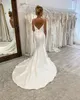 Eenvoudige licht ivoren zeemeermin trouwjurken sexy spaghetti riemen backless formele bruidsjurken boho tuin court trein bruid vrouwen receptie gewaden de mariee CL3460