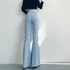 Jeans pour femmes 2024 printemps bleu clair en denim pantalon femelles coréen slim fit côté fendu femme vintage haute taille nouage