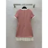 Vestimenta de vestimenta de vestimenta de ropa de lujo diseñador de falda larga logotipo de moda para mujer costura contrastante diseño de vestido de cuello redondo faldas de mangas cortas 03