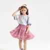 Saia curta luxuriante de crianças tutu para meninas saia tule rosa Puffy algodão renda infantil Saias de baby baby roupas de bebê com gravata borboleta 240329