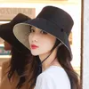 New Sun Hat Female Summer Summer Side Side Sidererman Hat Solid Color Fashion Discal Large Overhang Basin Hat Travel Sun Hat Sun واقي من طيبة قابلة للطي
