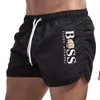 2023 Nouvelle plage de mode masculine Polyester multicolore Sports sports tripartites shorts pour hommes 40