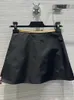 Jupes Baeromad Fashion Designer Summer Black Color Mini Jupe crayon Party Femme Sexy Couvrant Slim Solid Short