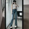 Kvinnors jeans blossade kvinnor med hög midja Split 2024 Stretch Slimming All-In-One Mopping Pants Female Front Pocket Retro Denim Byxor