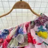 Kvinnor grundläggande casual klänningar Runway Gorgeous Flower Holiday Chiffon Dress Women Ruffles One Shoulder Floral Print Belt Lace Up Long Boho Robe Vestidos 2024