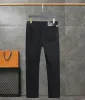 Jeans Slim Men Jeans clássicos masculinos de luxo para o homem Jean Baggy New calça