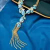 Hanger kettingen messing vergulde 18k gouden sprankelende strass turquoise kwastje ketting met trendy en niche -ontwerpen in Europa Amerika