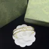 Braccialetti Charm Womens Regali Bangle 18k oro oro designer di lusso Gioielli Cuff Celtic in stile Celtic Fare di nozze Open Wholesale L46