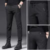 Nieuwe herencasual broek voor lente- en herfstseizoen Solid Color Losse Pitting Middle-Age Young Business Rechte Tube Long Men van middelbare leeftijd