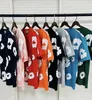 Designer puff bomull t-shirts män kvinnor denim tshirts tår shorts mode streetwear kort ärm lila byxor män överdimensionerade tees multicolor tshirt polos kläder