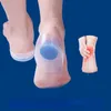 1Pair Bacsilos de gel de silicone macio para o calcanhar esporas de dor de almofada de pé de almofada massageador de altura do calcanhar de meio salto