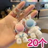 2024 Nouvelle série de dessins animés Silicon Material Astronaute Kelechains Graduation Small Gift Takeaway Milk Tea Shop Drainage Small Gift Couple Car Key Pendeur