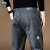 Oussyu Brand Vêtements Mens Pantalon de chargement 97% Coton Couleur de travail Couleur de travail Pant décontracté pantalon de jogger coréen Male 240328