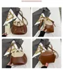 Sacs de créateurs Pu Handheld Backet Sac pour femmes New Fashion and Casual Bag Sac coréen Edition Simple Canvas Handbag High Sense Handbags Sac à main