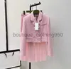 Designer Womens Two Piece Dress 24 early spring socialite style pink double breasted short jacket with coarse tweed patchwork pleated half skirt set