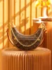 Top luksusowy projektant pętli torebka kobiety półksiężyc Croissant Crossbody elegancki design skórzany łańcuch na ramię klasyczny hobo torebka luksusowa marka portfel