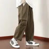 Herenbroek mannen vracht elastische taille vintage losse multi -zakken riem hiefbouwen solide kleur high street dagelijkse sport hiphop broek