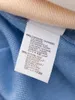 Magliette da donna da donna con paillettes cucitura t-shirt a colori solidi 2024 estate in cashmere blend tops lady o-collo corto sciolto