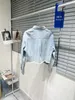 Chemises de chemisiers pour femmes Designer 23SS AUTUMN FUR EDGE LETTRE DE DENIM MANTE SOFF SOFT SAKINCE LAVE OLD TOP 6U4W