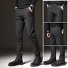 Nieuwe herencasual broek voor lente- en herfstseizoen Solid Color Losse Pitting Middle-Age Young Business Rechte Tube Long Men van middelbare leeftijd