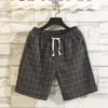 2023 Cotton and Hemp Beach Pants Summer Plaid Men's Shorts 5/4 Casual Pants Versatile Big Shorts Patch Style